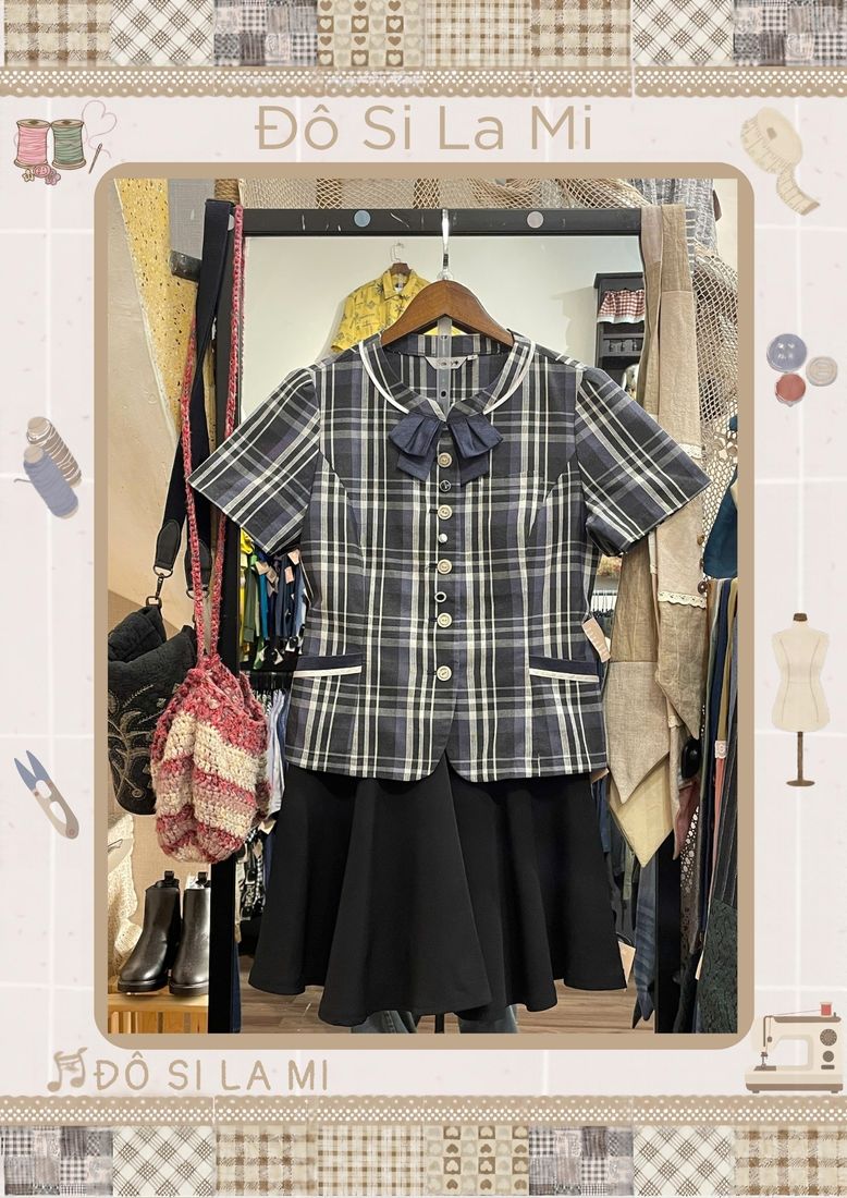 Áo sơ mi caro nơ xanh navy phối chân váy xòe đen
