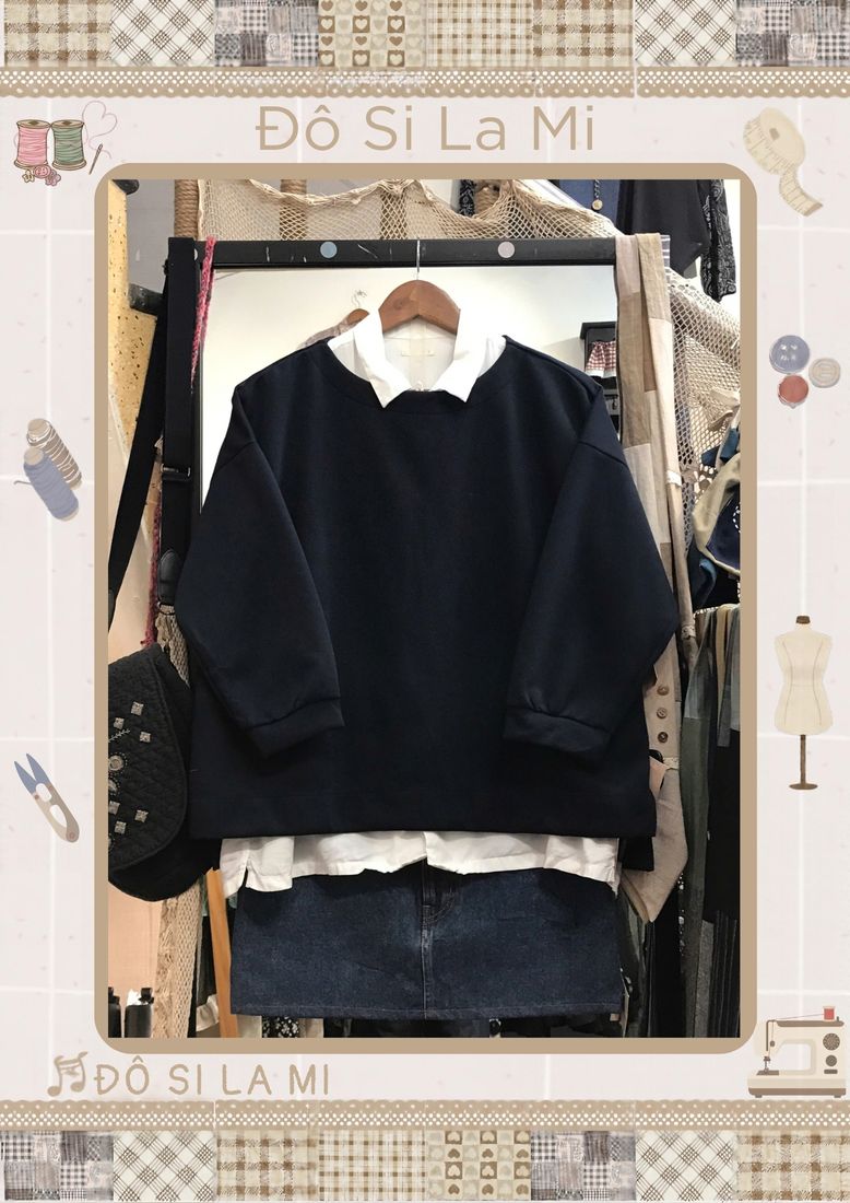 Áo len xanh navy phối áo trắng và chân váy denim xanh
